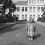 CAMBODIA. Phnom Penh. 6/03/2014: Woman from the Boeung Kak lake community who demonstrated and was arrested the day before is kneeling in front of City Hall, requesting a meeting about a retroactive compensation for her eviction.