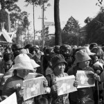 CAMBODIA. Phnom Penh 12/03/2014: 36 out of 39 families from Boeung Kak who still didn't get their land title show up at City Hall, holding a photograph of the house they were evicted from.