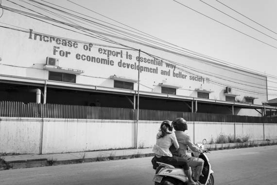 CAMBODIA. Phnom Penh 13/03/2014: Slogan on a garment factory near the E.Z. International Garment Factory where workers are on a strike to protest the non observance of labour laws by the management.