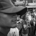 CAMBODIA. Phnom Penh 4/04/2014: Mu Sochua, opposition CNRP lawmaker, on her 4th attempt to reach the center of 'Freedom Park'. Municipal security guards preventing her from doing so prove her point that there is no freedom of speech or assembly since the early january crackdown by authorities on opposition demonstrations and striking workers.