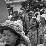 CAMBODIA. Phnom Penh 4/04/2014: Supporters of Vorn Pov, union leader jailed during the early january crackdown by the army of a worker's strike, demonstrate at the municipal court during a bail request hearing.