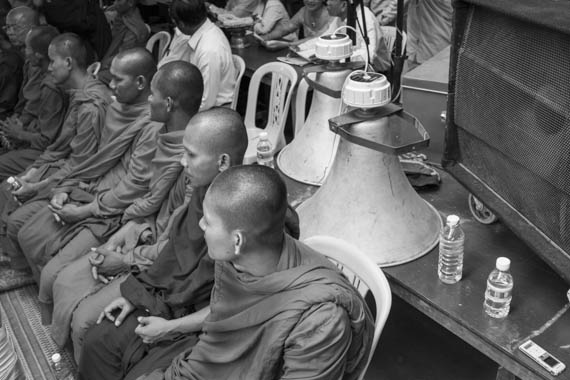 CAMBODIA. Phnom Penh 7/04/2014: Monks from the Independent Buddhist Monks Network at the 1st anniversary of the creation of the opposition CNRP, a merger between the Sam Rainsy Party the Human Rights Party, at the party headquarters.
