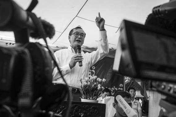 CAMBODIA. Phnom Penh 7/04/2014: Sam Rainsy, CNRP co president, addresses supporters on the1st anniversary of the creation of the opposition CNRP, a merger between the Sam Rainsy Party the Human Rights Party, at the party headquarters.