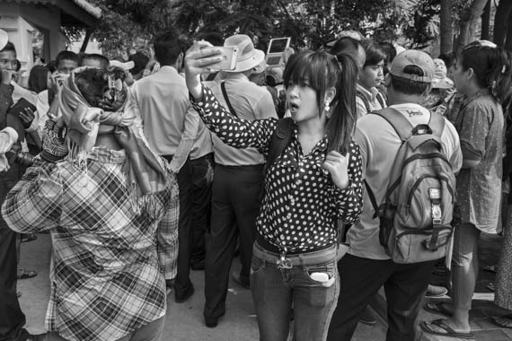 CAMBODIA. Phnom Penh 2/04/2014: Citizen journalist reporting on several communities who were evicted or are being threatened of being evicted, gather in front of City Hall to ask for a resolution of their issues.