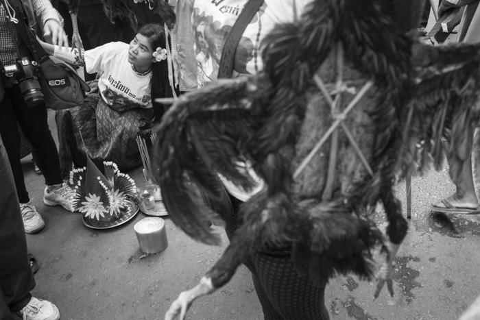 CAMBODIA, Phnom Penh. 20/05/2014: Tep Vanny, land rights activist, at a demonstration with dead chicken used for a cursing ceremony near the Phnom Penh Municipality Court during the trial of 23 workers and union leaders arrested during the violent crackdown on striking workers which resulted in 6 strikers killed on January 3rd.