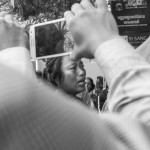 CAMBODIA, Phnom Penh. 23/06/2014: Woman crying in front of the journalists' cameras while representatives of families evicted from 100 Hectares of land in Kompong Chhnang demonstrate in front of the Ministry of Justice.
