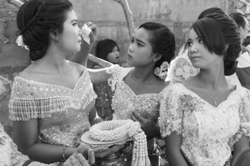 Cambodia, Phnom Penh. 4/06/2014: Ladies of honour waiting for HRH Princess Sisowath Pongsanmony to arrive at the commemoration ceremony for the loss of Kampuchea Krom to Vietnam in 1949, at the Samaki Reangsey pagoda.