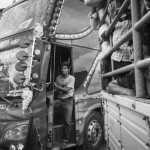 CAMBODIA, Poipet (Banteay Meanchey). 17/06/2014: Cambodian migrant workers in a bus and a truck provided by the Thai authorities to bring them back to their home country. In a massive movement of fear, some 180.000 cambodian migrant workers, many of them illegal, return home in one week time after the military coup in Thailand which vowed to normalise the situation of illegal immigration.