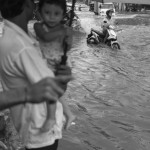 CAMBODIA, Phnom Penh. 4/07/2014: A heavy rain floods Sothearos Boulevard.