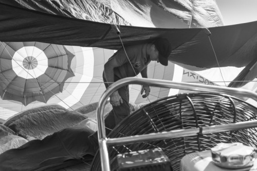 CAMBODIA, Phnom Penh. 1/07/2014: Andrew Parker, a hot air balloon pilot who travels to 100 different locations with the Flying High For Kids World Balloon Project for Unicef, prepares his aircraft.
