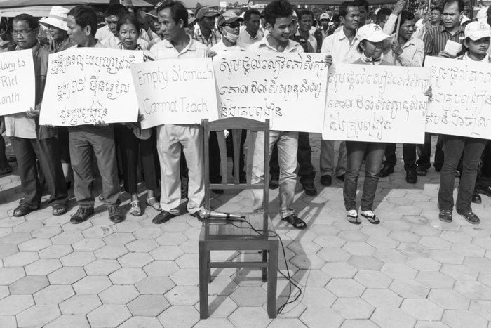 CAMBODIA, Phnom Penh. 5/10/2014: Chair and microphone for Rong Chhun, teachers' union leader, during a demonstration on World Teacher Day at Freediom Park.